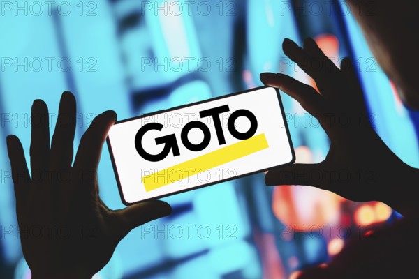 In this photo illustration, the GoTo Meeting logo is displayed on a smartphone screen