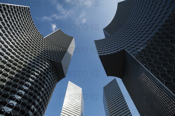 03/02/2018, Singapore, Republic of Singapore, Asia, A view of the two towers of the DUO project by German architect Ole Scheeren. The mixed-use development includes offices, flats, a luxury hotel and retail, Asia