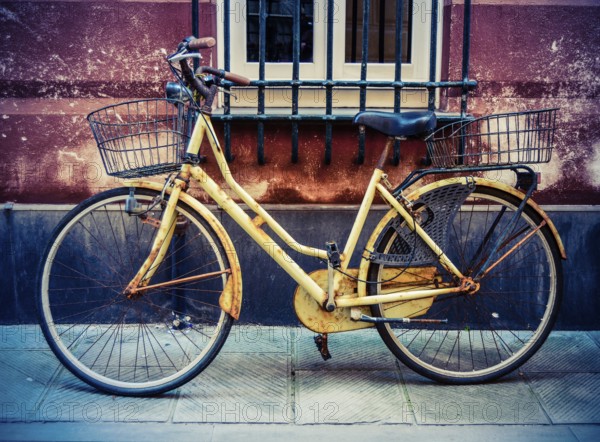 Rustic VIntage Old Bicycle On A Backstreet In Italy