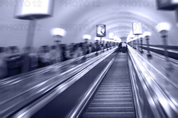 Escalators in a metro, a radial blurring