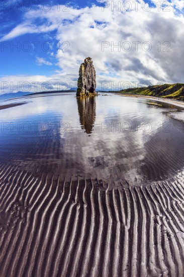 Northern coast of Iceland. Magic Rock Hvitsercur at sunset. Concept of extreme northern tourism. The picture was taken Fisheye lens