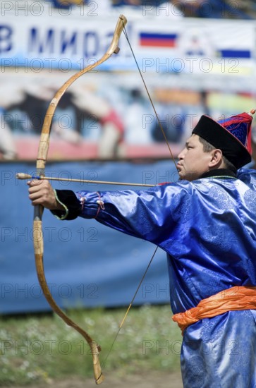 ULAN-UDE, RUSSIA - JULY 17: The 4th General Session of the World Mongolians Convention, July 17, 2010 in Ulan-Ude, Buryatia, Russia. Mongolian archery competition