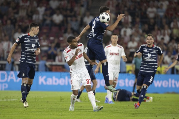 Linton Maina (1.FC Köln, Midfield, #37), William Mikelbrencis (Hamburger SV, Defence, #2), 2nd Bundesliga, 1. FC Köln, Hamburger SV on 02/08/2024 at the RheinEnergieStadion in Cologne Germany . (DFL/DFB REGULATIONS PROHIBIT ANY USE OF PHOTOGRAPHS AS IMAGE SEQUENCES AND/OR QUASI-VIDEO)