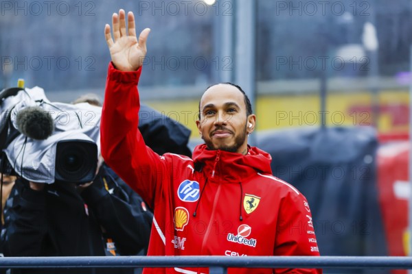 MELBOURNE, AUSTRALIA - MARCH 16: Lewis Hamilton of Great Britain and Scuderia Ferrari during the driver's parade at the 2025 Australian Grand Prix at Albert Park in Melbourne, Australia, Oceania