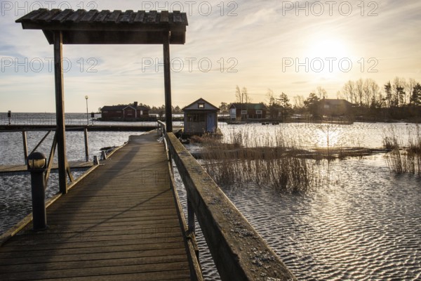 Harbour by the lake, landscape shot in autumn. Holiday village and harbour by the water in Sunnana Hamn in Sweden