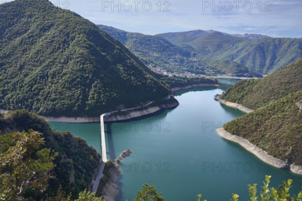 Pivsko jezero, Piva reservoir, behind the village of Plužine, bridge over the reservoir, Montenegro, Europe
