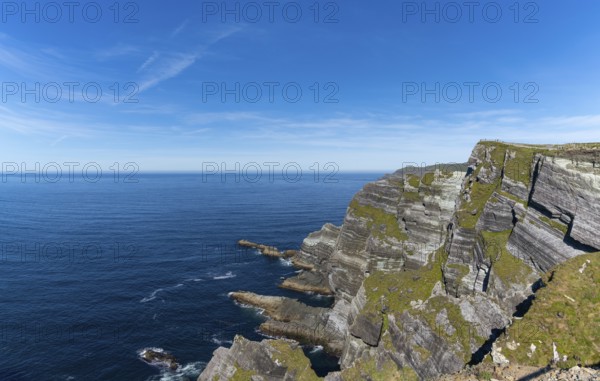 A view of the Kerry Cliffs and Iveragh Peninsula in County Kerry of Ireland