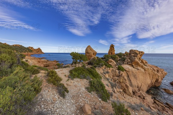 Coastal landscape with bizarre red rocks and sea view, Spiaggia di Cala E'Luas, Ogliastra, Sardinia, Italy, Europe