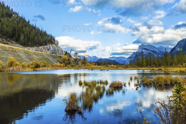Group of lakes in the Canadian Rockies. Autumn day on the lake Vermilion. The concept of ecological, photographic and active tourism
