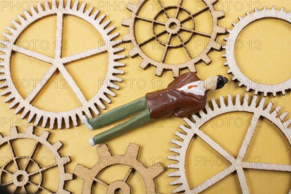 Industrial composition. Man with cogwheel gears