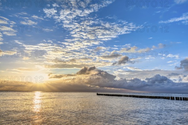 Wonderful sunrise at the beach in summer
