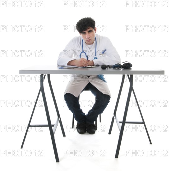 Male doctor with clipboard isolated over white background