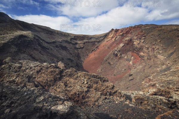 Amazing volcanic landscape. Volcanic crater in Timanfaya national park, Lanzarote, canary islands, Spain, Europe