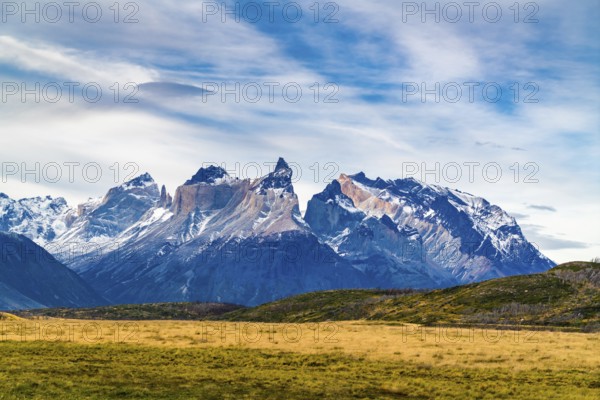 View of the beautiful mountain and large pasture at Torres del Paine National Park in Chile