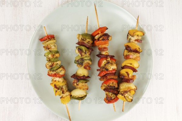 Kebab from meat and vegetable on plate, top view . BBQ food concept