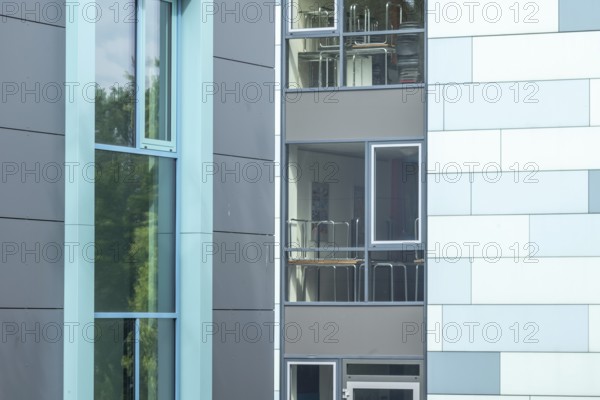 Modern office building with blue-green windows