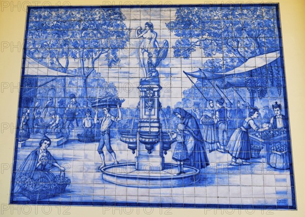 Old azulejos (wall tiles) with historical motifs in Funchal, Madeira
