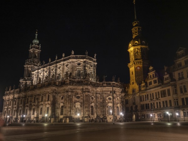 Illuminated historical church building with high tower at night, Dresden, Saxony, Germany, Europe