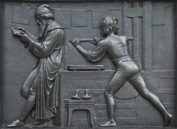 Sculptor Bertel Thorvaldsen inaugurated in 1837, bronze relief on the plinth: workshop scene Gutenberg with young assistant