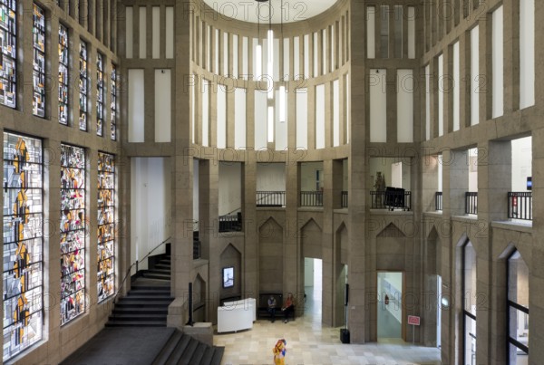 Central entrance hall with staircase and Jan Thorn-Prikkers leaded glass window mural
