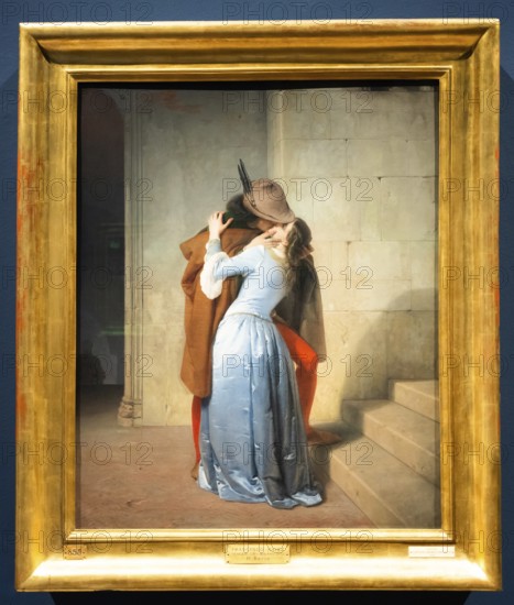 Milan, Italy, 23 September 2023: Brera antique painting museum. The Kiss, Il Bacio, by Francesco Hayez, 1859, Europe