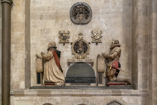 Canterbury, United Kingdom, 10 September, 2022: statue and artwork of praying men inside the Canterbury Cathedral, Europe