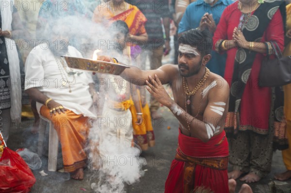 21.01.2019, Singapore, Republic of Singapore, Asia, A devout Hindu prepares for the Thaipusam festival procession at the Sri Srinivasa Perumal Temple in Little India, which leads to the Sri Thendayuthapani Temple on Tank Road, 4 kilometres away, Asia