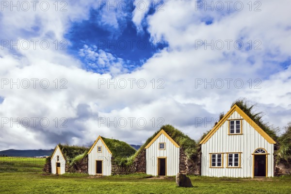 The village of old houses covered with turf and grass. Ethnographic Museum-estate Glaumbaer, Iceland. The concept of the historical and cultural tourism