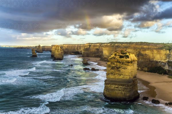 The rocks Twelve Apostles in an ocean storm surf. Travel to Australia. Fantastic morning light on the Pacific coast about Melbourne. Concept active and phototourisme