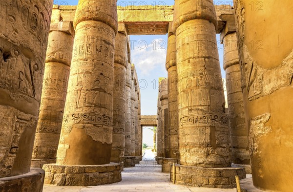 Central colonnade of Karnak temple in Luxor at sunrise, Egypt, Africa