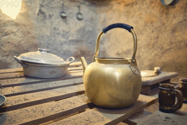 Kitchenware inside of interior of traditional mud brick made beehive houses. Harran, major ancient city in Upper Mesopotamia, nowadays is a district in Sanliurfa province, Turkiye