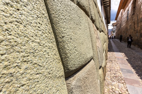Twelve angles stone, Beautiful narrow street and buildings wall in centre of Cusco or Cuzco city, Peru. South America
