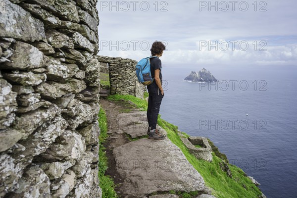 Visitors on the steep path up to the monastery, Skellig Michael island, Mainistir Fhionáin (St. Fionan?s Monastery), county Kerry, Ireland, United Kingdom, Europe