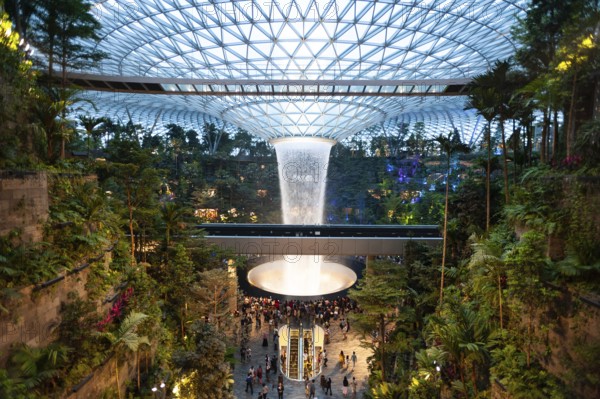 28.04.2019, Singapore, Republic of Singapore, Asia, View of the new Jewel Terminal with waterfall and Forest Valley at Changi International Airport. The design was created by the architecture firm Moshe Safdie, Asia