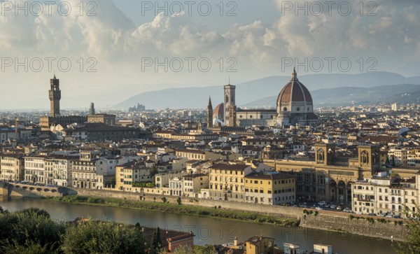 Panoramic Skyline of the historical city of Florence in Italy from Michelangelo piazza just before the sunset