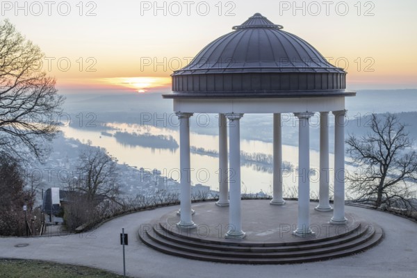 Beautiful temple in a landscape shot. Sunrise on a winter morning. Beautiful view along the Rhine at the Niederwaldtempel, Niederwalddenkmal, Hesse, Germany, Europe