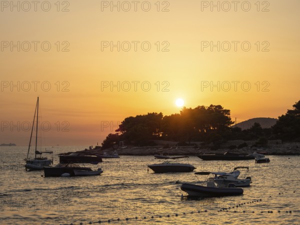 Sunset, boats in the harbour, town of Hvar, island of Hvar, Dalmatia, Croatia, Europe
