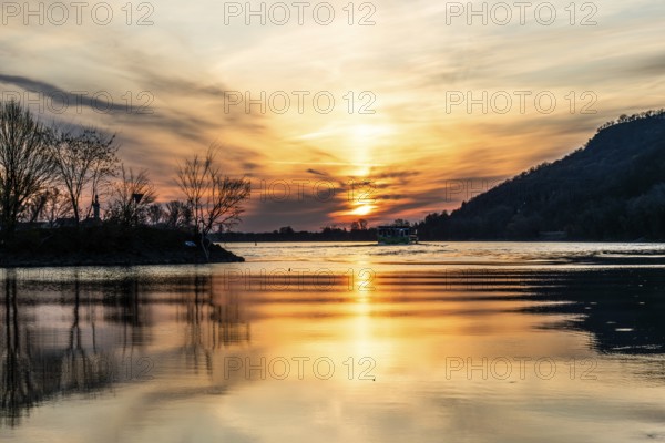 Morning atmosphere on the river, cruise ship on the Danube, near Rossatz, golden hour at sunrise, Wachau, Lower Austria, Austria, Europe