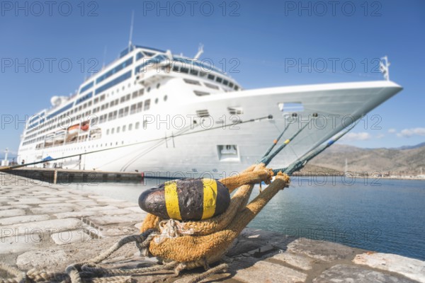 Big white cruise ship. Synny day. Greece