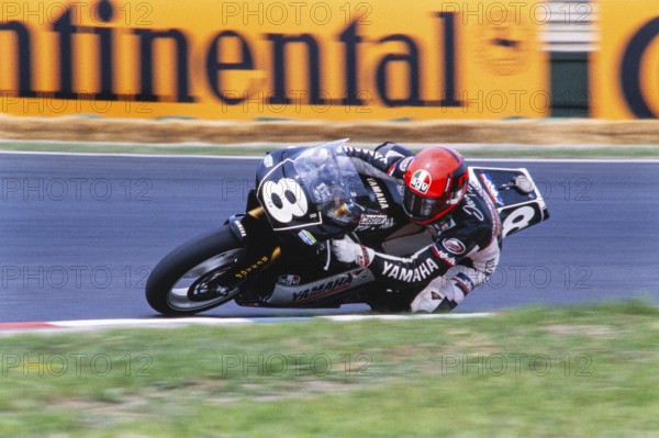 The German Jochen Schmid on the race track on Yamaha 250 cc, German Mitsui-Yamaha Team, Motorcycle World Championship, GP of Germany at the Hockenheimring on 14 June 1992