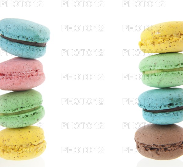 Cadre of stacked colorful macaroons isolated white background