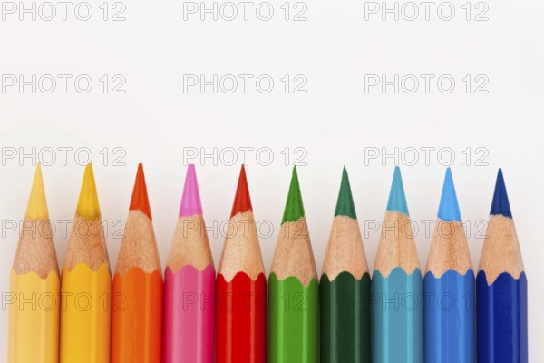 Many different coloured pencils on a white background, Many different colored pencils on white background Austria