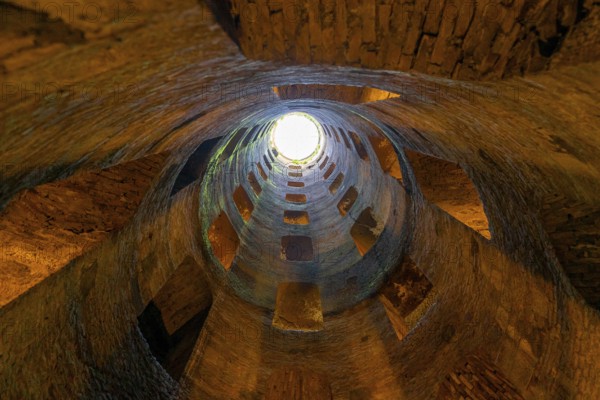 Orvieto, Italy, 18 November, 2023: view looking up from St. Patrick's Well in downtown Orvieto, Europe