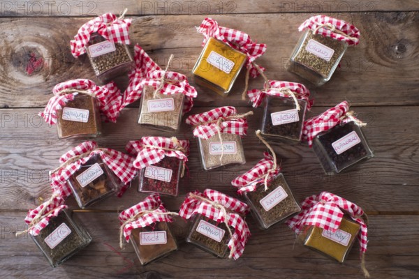 Of small glass jars for storage of various types of aromas for international cuisine