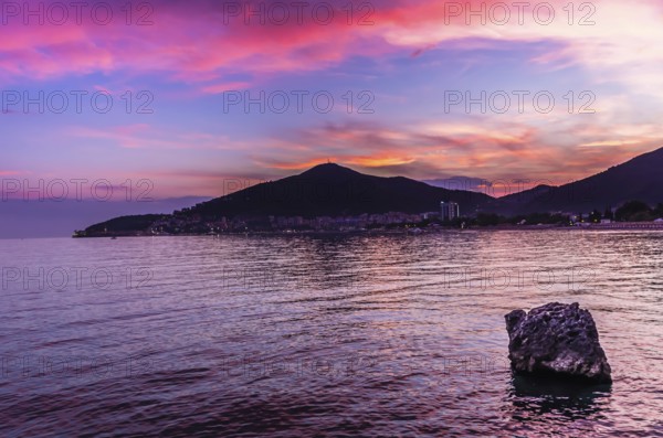 Sunset view on sea and Budva, Montenegro, Europe