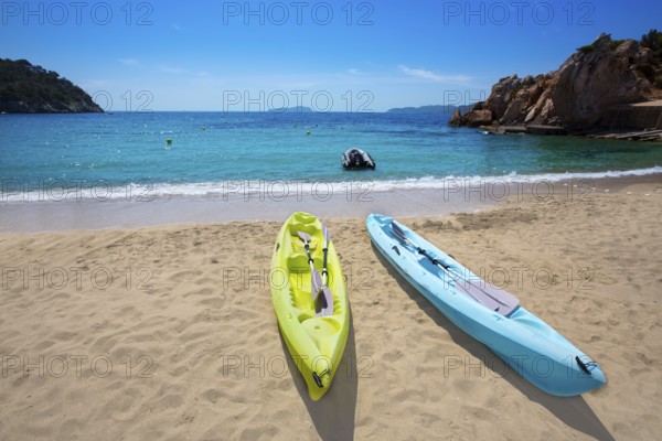Ibiza cala Sant Vicent beach with Kayaks san Juan at Balearic Islands of spain