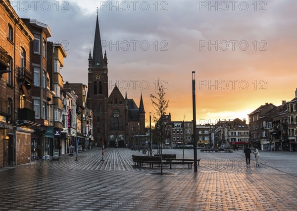 Jette, Brussels Capital Region, Belgium, 04 02 2020 The Place Miroir, the main town square during a colorful sunset in lockdown, Europe