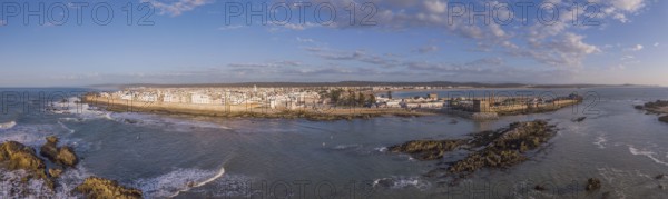 Aerial panorama of medieval Essaouira old city on Atlantic coast at sunset, Morocco, Africa