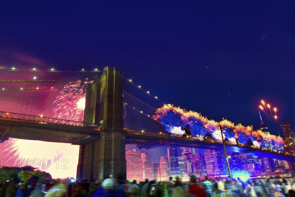 July 4th 2014 fireworks at Brooklyn bridge Manhattan skyline New York USA