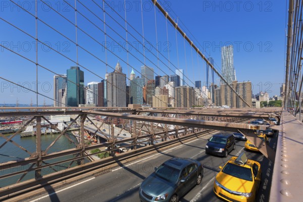 Brooklyn Bridge traffic and Manhattan New York City US USA